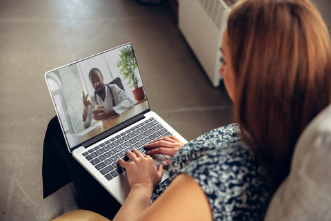 telehealth Close up of young woman getting online medical help and advice during videocall with doctor checking symptoms