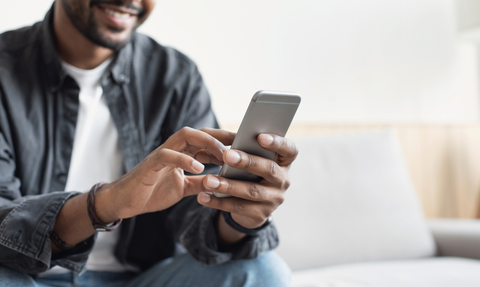 Smartphone app man using smartphone