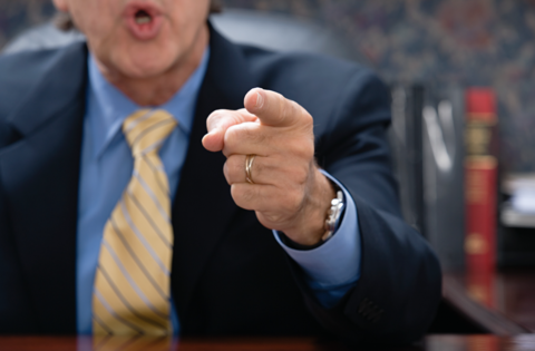 Finger pointing executive Finger pointing executive