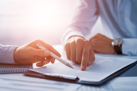 Business contract broker document Human hands working with documents at desk and signing contrac