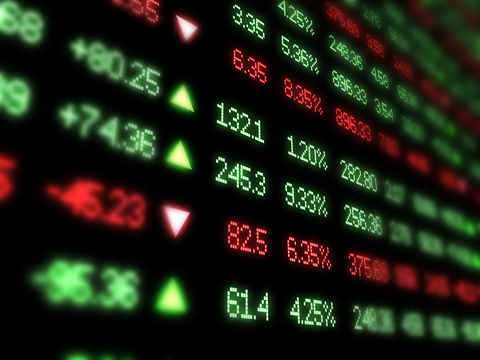 Stocks earnings finance A closeup of a stock market ticker