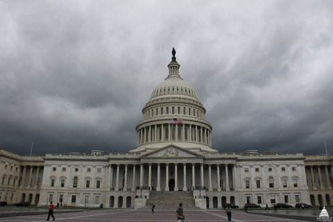 US Capitol with storm clouds stormy Capitol