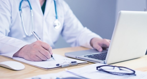 remote monitoring doctor at laptop remote patient monitoring by doctor at laptop