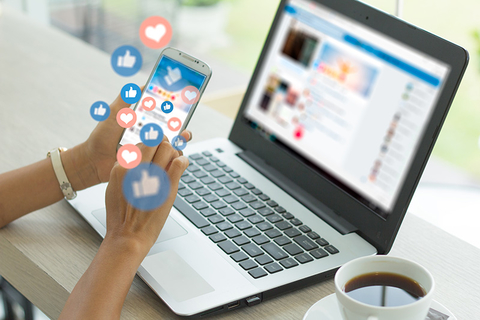 woman on laptop using social media woman on laptop using social media