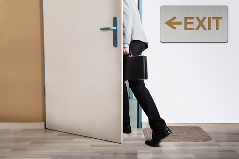 Exit Businessperson walking out