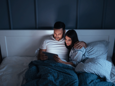 RTW watching video couple watching video