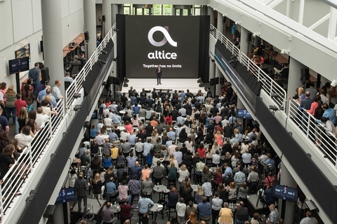 Altice USA Altice USA logo amid crowd