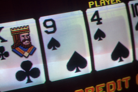 Closeup of video poker machine Closeup of video poker machine screen