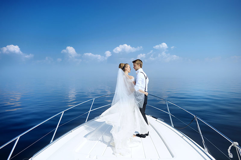 Cruise Ship Wedding Getty Happy bride and groom on a yacht