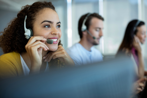 Customer service call center Woman on phone at call center