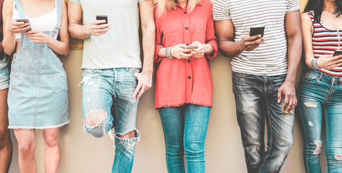 smartphones group of people holding smartphones