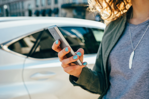 person holding smartphone person holding smartphone