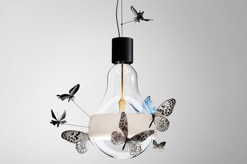 Flatterby Designer Ingo Maurer launched the limited-edition Flatterby, a hanging lamp with 10 handmade butterflies flitting around the bulb.