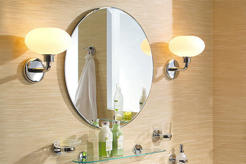 Lighting by GINGER GINGER, the sister brand of Newport Brass, introduced sconces in each of its accessory collections that illuminate the bathroom mirror.