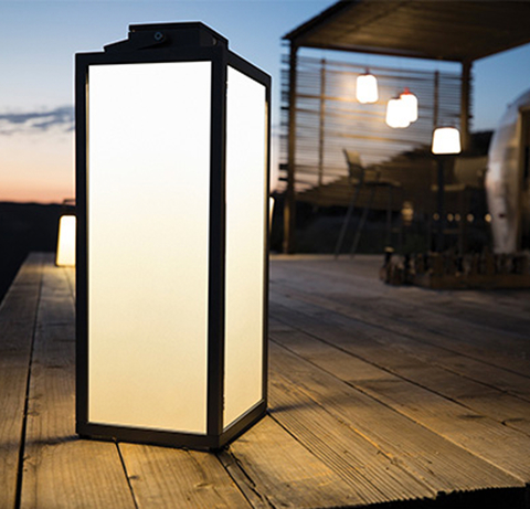 Tradition outdoor lighting Tradition has a tall, slender silhouette with simple details such as a minimalist-style frame and rectangular windows.