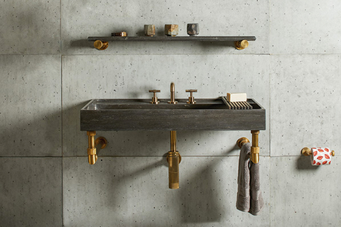 Ventus wall hung sink Starting with a solid block of stone, the sink was carved and honed into a thin-walled basin with linear horizontal surfaces.