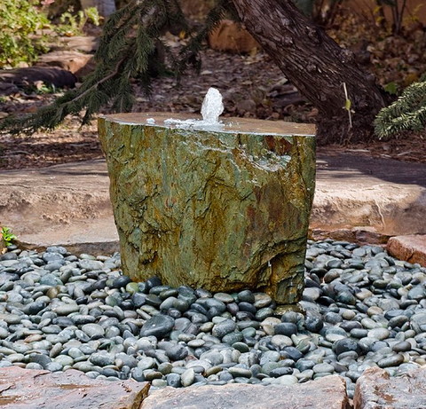 French slate fountain True to its name, the French slate fountain is carved from large pieces of fine-grained metamorphic rock imported from Maël-Carhaix, Côtes-d’Armor, Brittany in northwestern France.