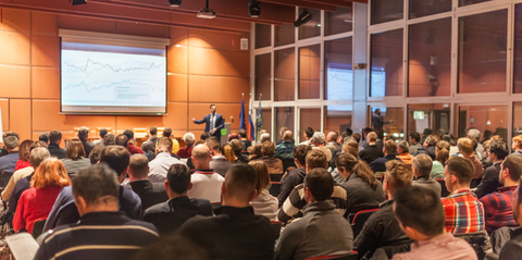 Convention Meeting Getty Business speaker giving a talk in conference hall