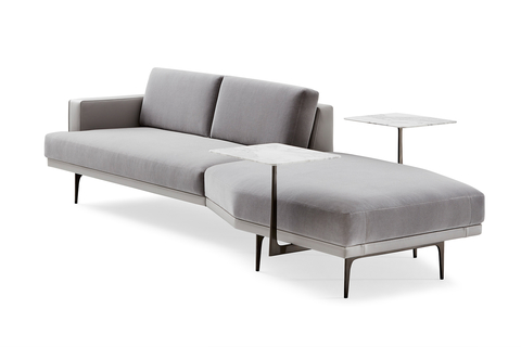 Lyda sofa The Lyda sofa, designed by Lauren Rottet, is upholstered in a warm neutral mohair and gray leather, and complemented by steel arms and a marble tablet surface.