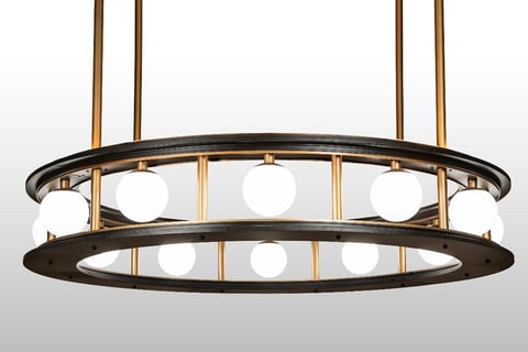 Reginald LED pendant The pendant is engineered in sections and can be assembled on-site to encompass a column at the location.