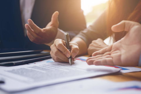 Businesswoman signing a contract Business documents being signed
