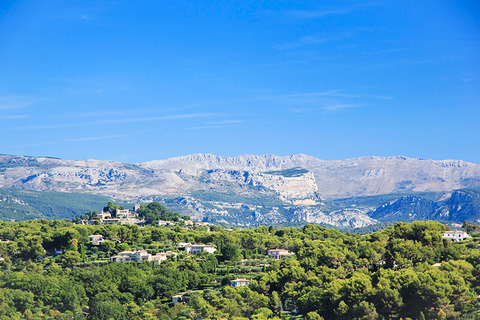 Mougins, France // Photo by simongurney/iStock/Getty Images Plus/Getty Images hillside villas and mountains in Mougins, France