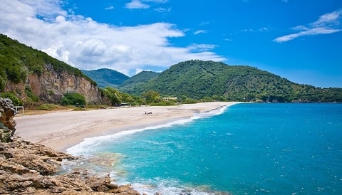 Karavostási, Greece - master2/iStock/Getty Images Plus/Getty Images beach at Karavostási, Greece - master2/iStock/Getty Images Plus/Getty Images