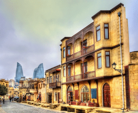 Baku Azerbaijan Getty Old Town of Baku in Azerbaijan with the Flame Towers in the background