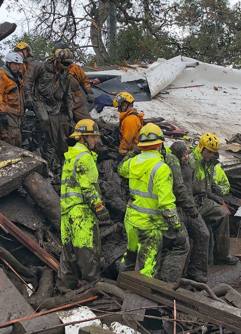 California Mudslides Newscred Travel Group Only Firefighters successfully rescue a 14-year-old girl, right, after she was trapped for hours inside a destroyed home in Montecito, CA.