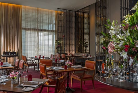 St. Regis Mexico City restaurant Diana Tables and chairs in a restaurant