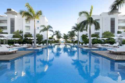 Wymara Resort Pool Image of pool with buildings lining its sides