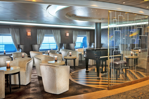 Seven Seas Navigator Lounge Image of lounging room with Grand Piano