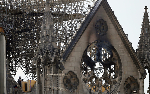 Notre Dame Restoration Newscred Editorial Travel Group Only A worker checks on a wooden support structure placed on the Notre Dame Cathedral in Paris.