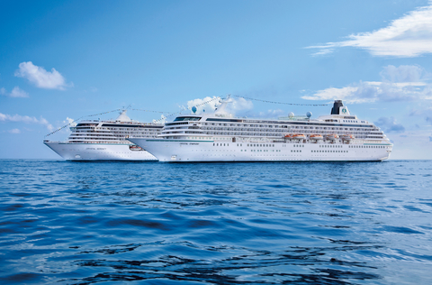 Crystal Symphony and Crystal Serenity Image of the two ships sailing parallel to each other