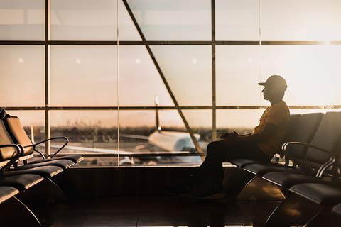 man waiting at airport man waiting at airport