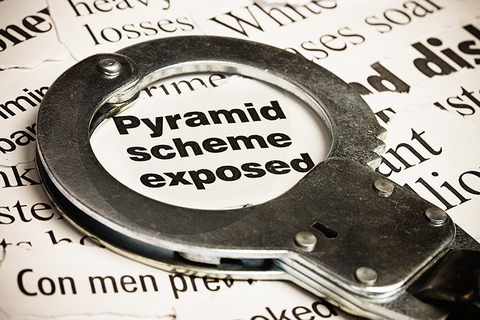 pyramid scheme exposed with handcuffs pyramid scheme exposed with handcuffs