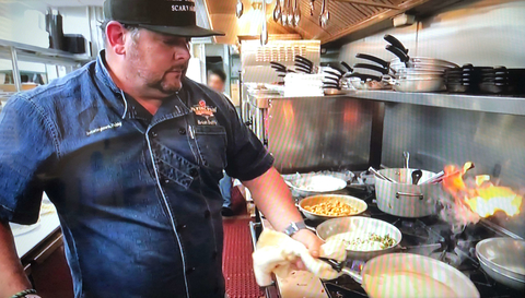 Chef Brian Duffy in the kitchen on Food Network's Opening Night reality TV show