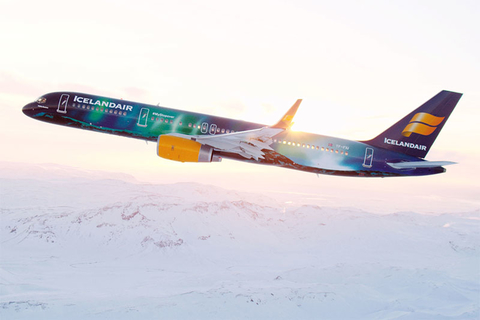 Icelandair Editorial Icelandair airplane flying over snow