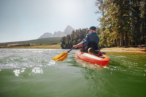 Retirement Kayaking Credit jacoblund iStock Getty Images Plus Getty Images Old man paddling a kayak on a summer day