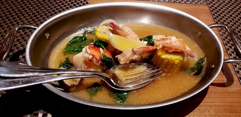 Clam Bake Entree at the Colonnade on Seabourn Ovation. A Thomas Keller selection. Photo by Susan J Young. Editorial Use Only Clam Bake Entree at the Colonnade on Seabourn Ovation. A Thomas Keller selection. Photo by Susan J Young. Editorial Use Only