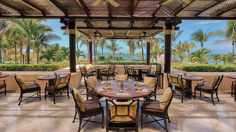 Four Seasons Resort Punta Mita outdoor room with tables and chairs