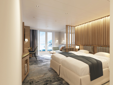 Quark Expeditions: Ultramarine Image of the bedroom with white beds