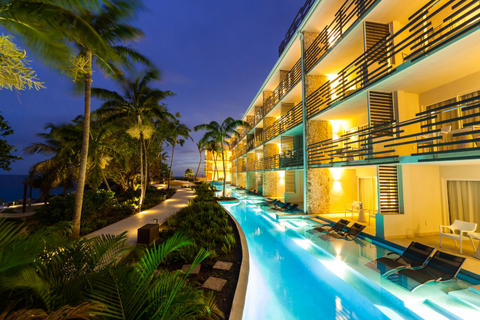 Sonesta Ocean Point Resort Exterior of resort with pool grazing its side