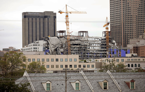 Hard Rock Hotel New Orleans Collapse Editorial Newscred Travel Group Only Debris hangs on the side of the building after a large portion of a Hard Rock hotel under construction suddenly collapsed in New Orleans.
