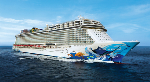 Norwegian Escape Image of cruise at sea with images of sea life plastered to surface