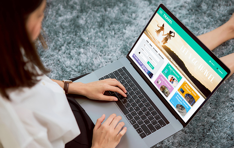 woman with laptop booking travel woman with laptop booking travel