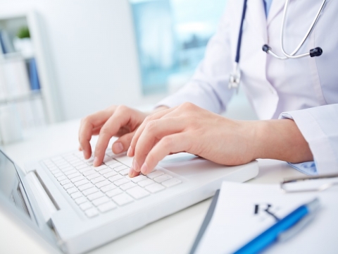Doctor and laptop (credit: Getty/shironosov) Doctor typing on laptop