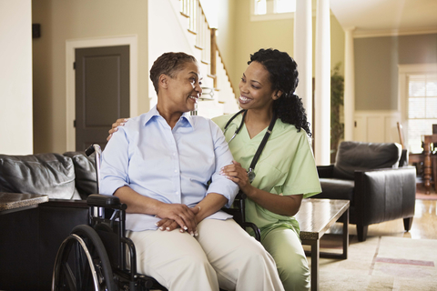 Doc and patient in wheelchair Doctor and patient in wheelchair