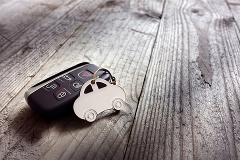 car keys on wooden table // Photo by BrianAJackson/iStock/Getty Images Plus/Getty Images car keys on a wooden table