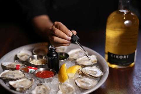 Kikori Whiskey and oysters on the half shell Kikori Whiskey and oysters on the half shell by Antonia Lofaso at Black Market Liquor Bar